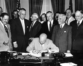 President Eisenhower signing HR7786, changing Armistice Day to Veterans 